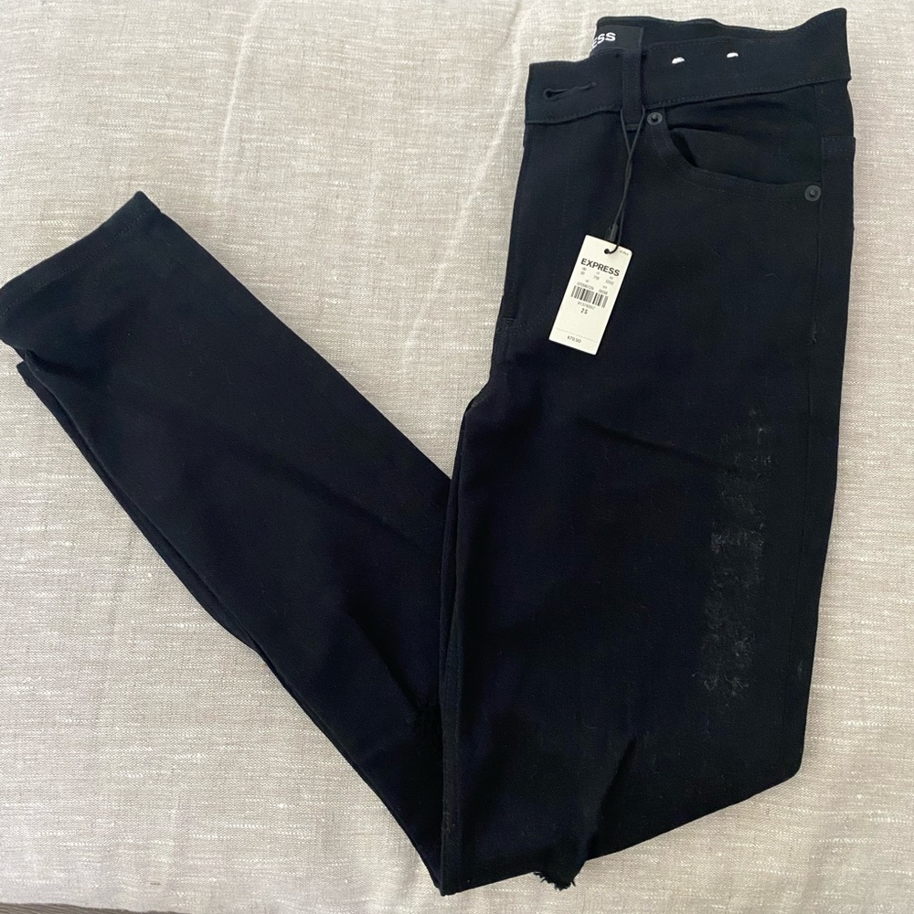 Black distressed skinny jeans